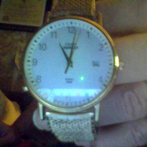 ladies gold tone Timex Indiglo watch